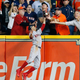 Illustration for article titled Fan Robs Jose Altuve Of Game-Tying Dinger, Or Maybe Robs Mookie Betts Of Spectacular Catch